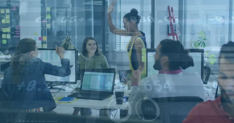 Diverse Team Celebrating Success in Office with Tech Overlay