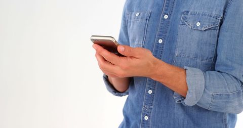 Casual Man Engaging with Smartphone Technology - Download Free Stock Images Pikwizard.com