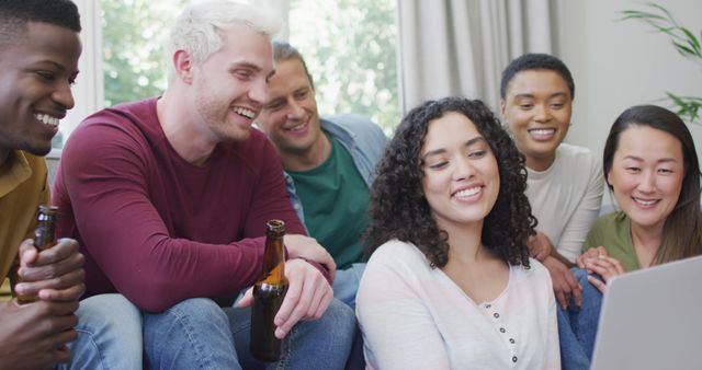 Group of Friends Smiling and Enjoying a Laptop Together - Download Free Stock Images Pikwizard.com