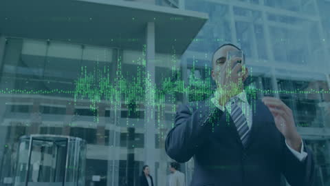 Businessman Analyzing Data Graphics on Smartphone