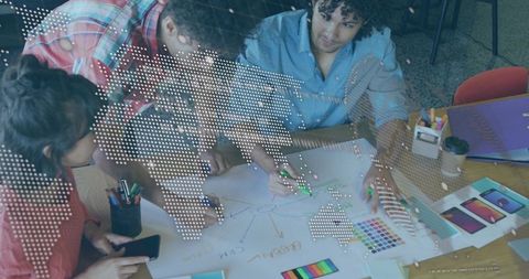 Creative Team Brainstorming Design Ideas in Modern Office