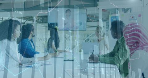 Diverse team meeting with virtual colleague in modern office