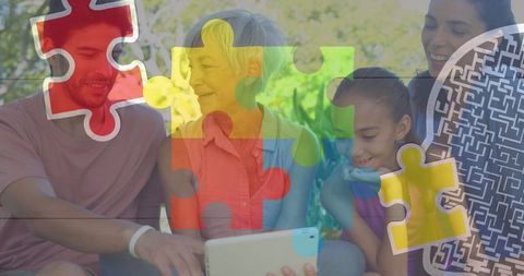 Diverse Family Bonding Outdoors with Tablet and Puzzle Overlay