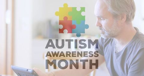 Autism awareness month campaign featuring man using tablet with multicolor puzzle logo
