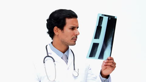 Doctor Examining X-ray with Focus and Precision
