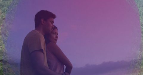 Diverse Couple Embracing in Tranquil Purple Haze