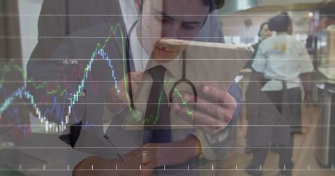 Doctor Analyzing Medical Data on Tablet in Industrial Kitchen
