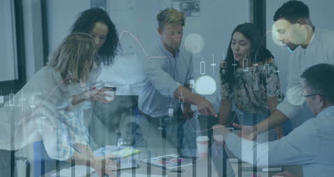 Diverse Team Collaborating on Data Analysis with Financial Charts