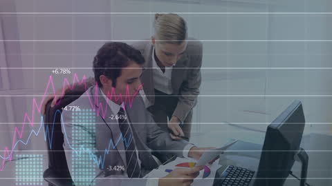 Business Professionals Analyzing Crucial Data Trends at Office Desk