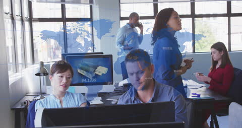 Diverse Team Collaborating in Modern Office with Global Business Projection