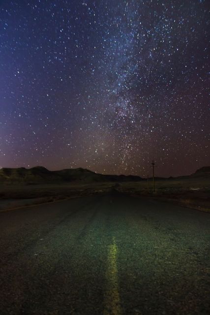 Starry Night Sky Over Deserted Road in Remote Area - Download Free Stock Photos Pikwizard.com
