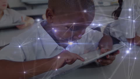 Young Diverse Students Engaging with Tablet Technology in Classroom