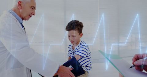 Doctor Measuring Child's Blood Pressure with Cardiograph Overlay