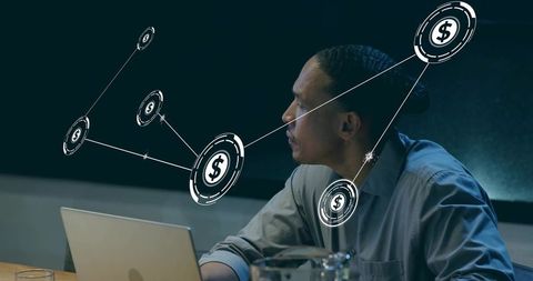 Studying digital currency network on laptop at conference table