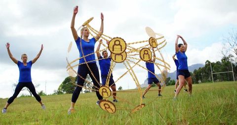 Group fitness training with futuristic fitness tracker