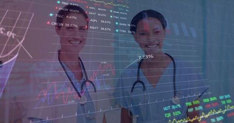 Nurses viewing clinical data dashboards on transparent display for healthcare analytics