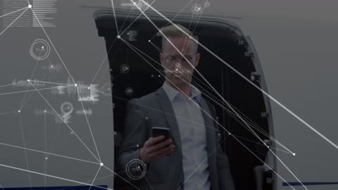 Businessman Arriving at Airport with Digital Network Overlay