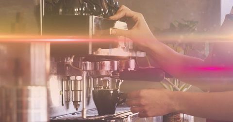 Barista Crafting Espresso Drinks with Creative Lighting