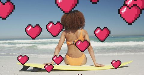 Woman on Surfboard with Heart Digital Icons at Beach