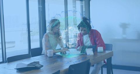 Young Professionals Reviewing Plans and Tablet with AR Globe in Modern Office