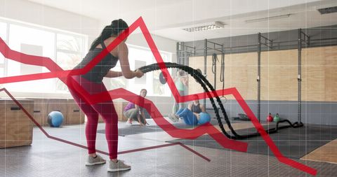 Data visualization overlay on cross training woman in gym