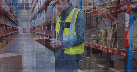 Warehouse Worker Analyzing Financial Data in Stock Storage - Download Free Stock Images Pikwizard.com