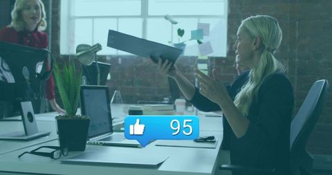 Collaborative teamwork in modern office environment with digital connectivity