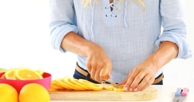 Woman Slicing Fresh Citrus Fruits in Kitchen - Download Free Stock Images Pikwizard.com