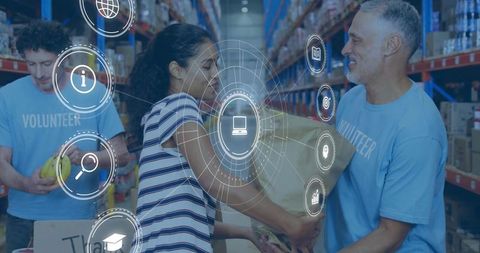 Hispanic Volunteer Lifting Paper Bag in Warehouse Aisle with Digital Logistics Icons
