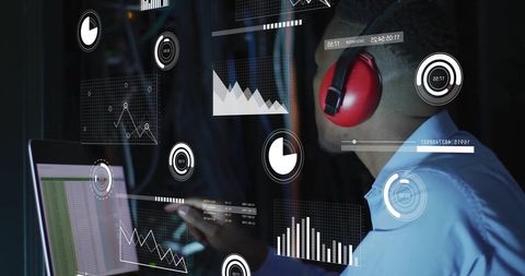 Engineer in Data Server Room with Technology Analytics Display - Download Free Stock Images Pikwizard.com