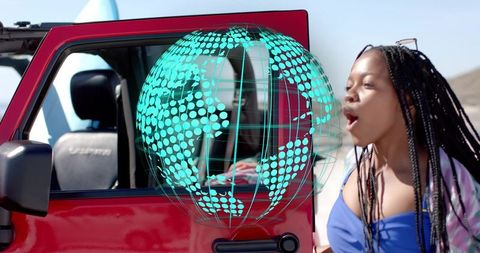 Woman Speaking by Red Jeep with Digital Globe Interaction