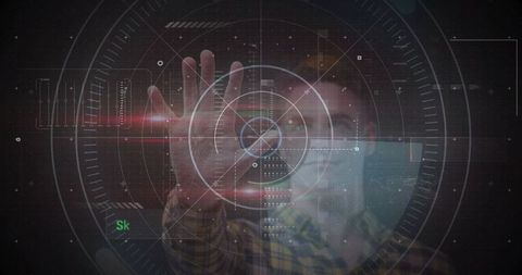 Adult male manipulating holographic interface with gesture control, futuristic hud reticle