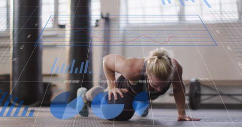 Woman performing medicine ball pushup with fitness hud overlays, strength and core training