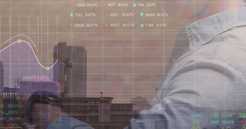 Businessman Reviewing Stock Market Trends on Digital Tablet