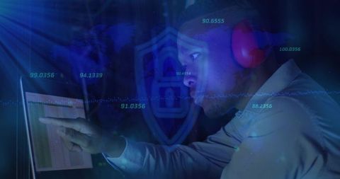 Cybersecurity Analyst Pointing at Laptop with Holographic Data Overlays and Shield Interface