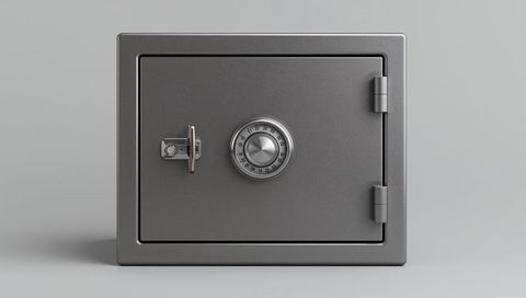 Securing valuables with compact steel safe featuring combination dial and keyed lock
