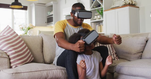 Father and Daughter Exploring Virtual Reality at Home - Download Free Stock Images Pikwizard.com
