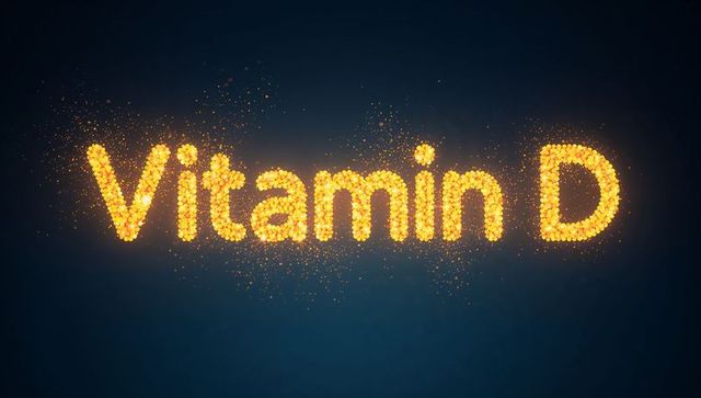 Glowing Vitamin D lettering formed from golden particles with sparkles on deep blue