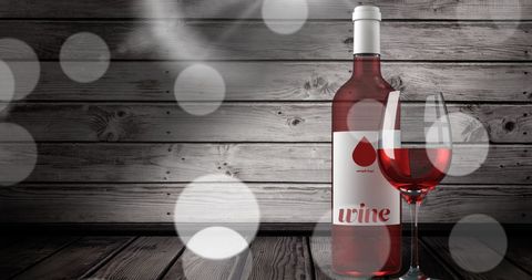 Rose Wine Bottle and Glass of Wine with Wood Background and Light Effects - Download Free Stock Images Pikwizard.com