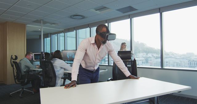 Male Professional Testing Virtual Reality Device in Modern Office - Download Free Stock Images Pikwizard.com