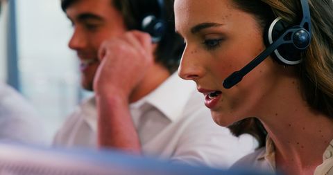 Focused Call Center Professional Engaging with Customers