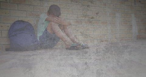 Sad child with textured overlay depicting loneliness
