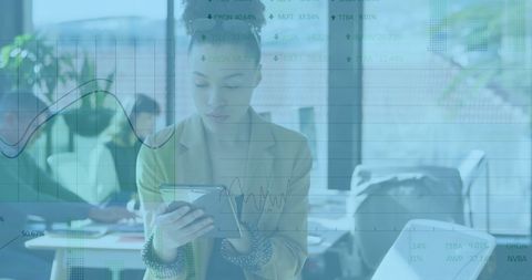 Businesswoman Examining Financial Data on Tablet in Modern Office - Download Free Stock Images Pikwizard.com