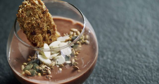 Healthy Chocolate Pudding with Granola and Nuts in Glass Bowl - Download Free Stock Images Pikwizard.com
