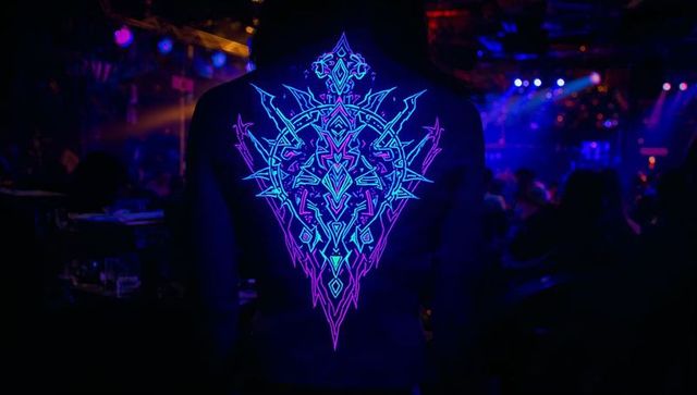 Neon attire at lively nightclub event with dj booth