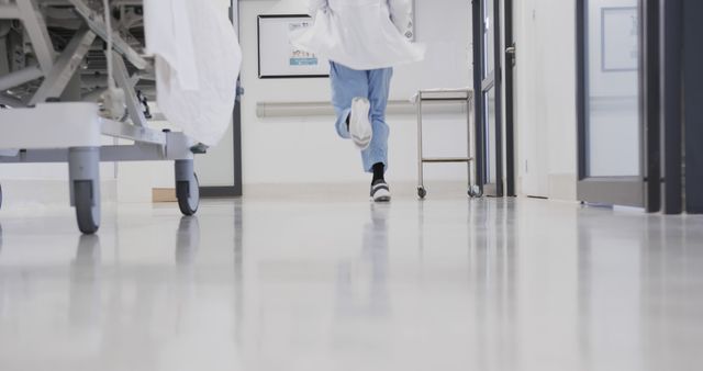 Doctor Running in Hospital Corridor for Emergency - Download Free Stock Images Pikwizard.com