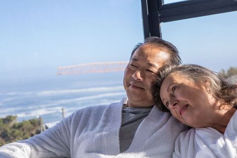 Senior Couple Enjoying Relaxing Spa Day with Ocean View