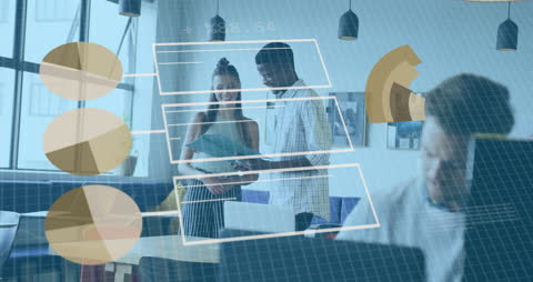 Diverse Team Analyzing Business Reports in Modern Office