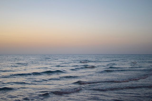 Calm Ocean Waves at Sunset - Download Free Stock Photos Pikwizard.com