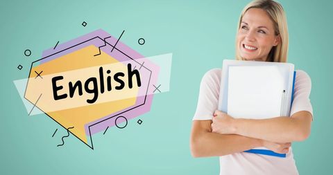 Smiling female teacher embracing books for english class